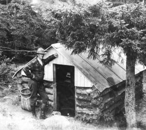 A ranger visits the observer’s cabin on Crane Mountain.