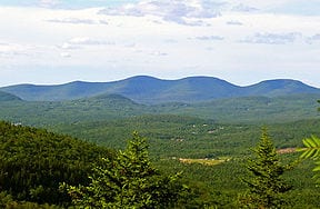 Blackhead Mountain is the peak in the distance on the far right. Photo from Wikipedia.