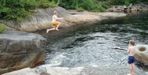 Rory plunges into the Cold River at Millers Falls.
