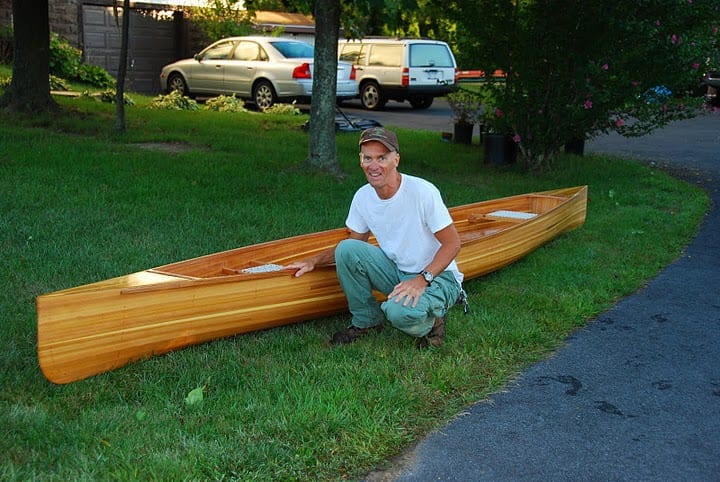 DSC_0263 Mike Nolan with the cedar-strip canoe he won in a raffle.