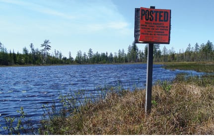 The DEC asked the landowners to remove no-trespassing signs on Mud Pond (above) and Shingle Shanty Brook. Photo by Phil Brown