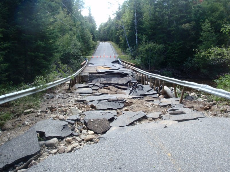 The West Branch of the Ausable undercut this section of Adirondak Loj Road. Photo by Phil Brown.