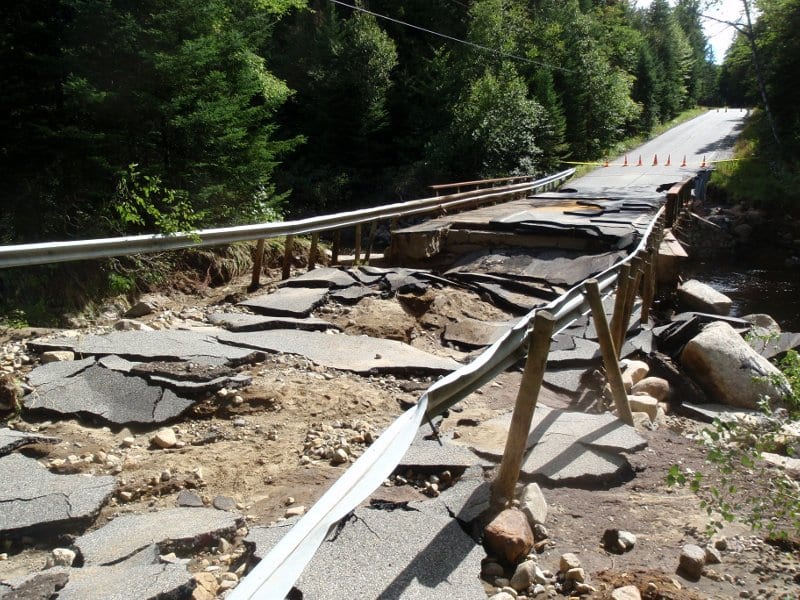 bridge out A section of Adirondak Loj Road collapsed near the West Branch of the Ausable. Photo by Phil Brown.