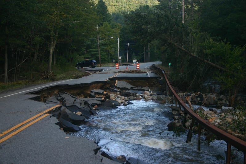 roaring brook on rt 73 Roaring Brook carved a new channel under Route 73 near St. Huberts. Photo by Tom Woodman.