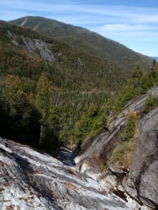 The slopes sharply to the climber's left. Photo by Phil Brown.