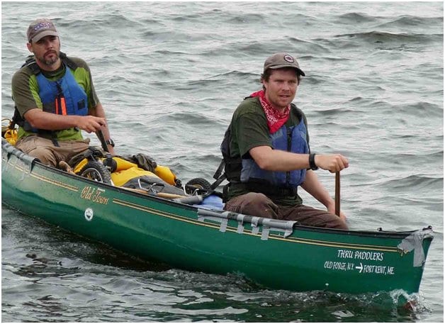 men in a canoe