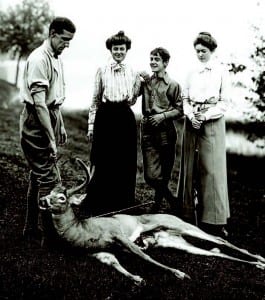 Dr. Edward L. Trudeau Jr., Wenonah Wetmore, William Seward Webb Jr., and Frederica Vanderbilt Webb, with a young stag, 1902.