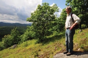 CATS Executive Director Chris Maron takes in the view from Cheney Mountain. Photo by Susan Bibeau