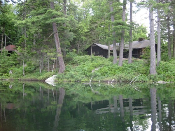 The rustic lodge on Mays Pond. Photo courtesy of Adirondack Land Trust.