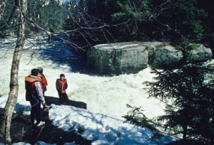 Pat Cunningham was the first outfitter to offer rafting trips through the Hudson River Gorge. He is shown in this 1986 photo (right) next to the Indian River. Photo by Nancie Battaglia