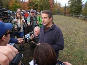 Governor Andrew Cuomo talks with reporters at Boreas Ponds, part of sixty-nine thousand acres the state has agreed to purchase from the Nature Conservancy. Photo by Phil Brown
