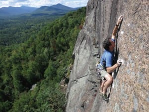     Jim Lawyer finesses his way up Hold It Like a Hamburger (5.11d) on Potter Mountain. Photo by Colin O'Connor