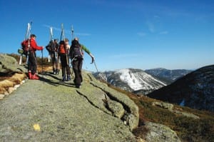 Skiers enjoy the view from the summit of Wright. Photo by Susan Bibeau