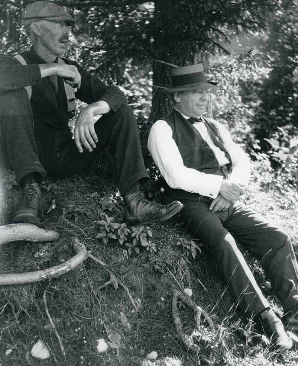 In this photo from the book, Herb Clark (left), the family guide, relaxes with Louis Marshall. Photos provided by Adirondack Museum
