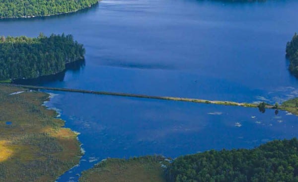 An Adirondack Scenic Railroad train travels between Saranac Lake and Lake Placid. By Nancie Battaglia