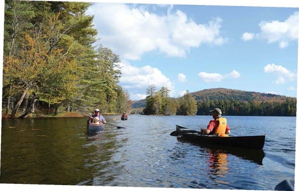 Explorer Editor Phil Brown, right, chats with Mike Carr, executive director of the Adirondack Nature Conservancy, on Third Lake.