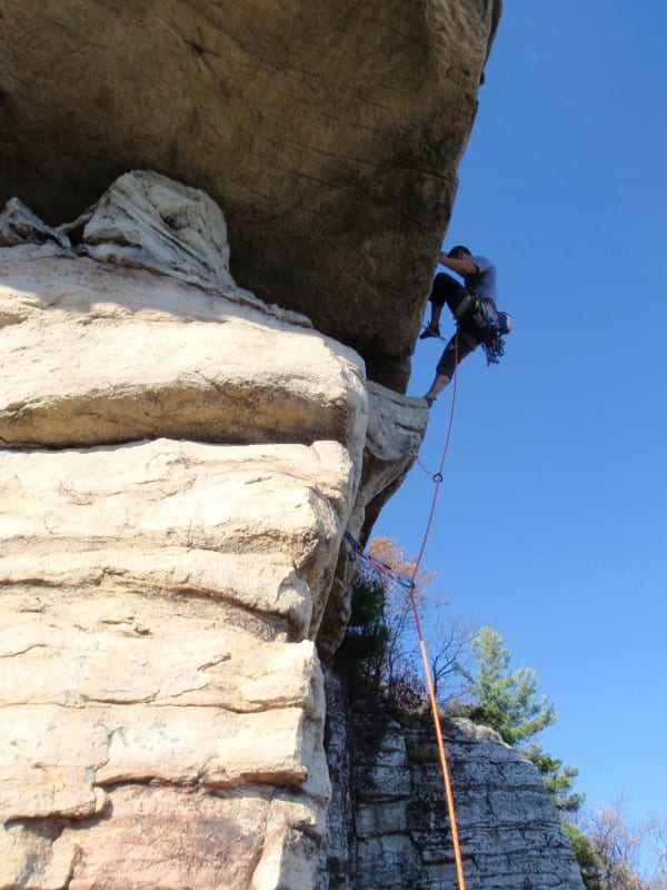 Nyle Baker finishes the crux on High Exposure.