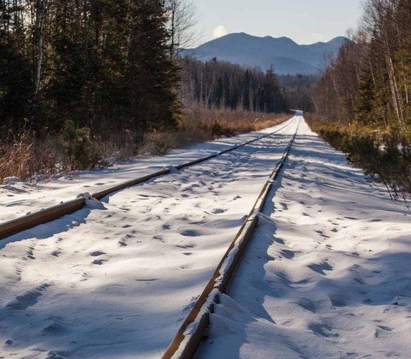 Snowmobilers complain that tracks often prevent them from riding in the rail corridor. Photo by Nancie Battaglia