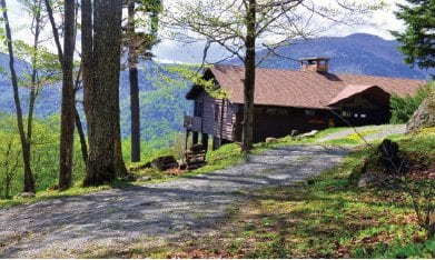 A house perched above Keene Valley looks out toward the Great Range. PHOTO BY GEORGE EARL