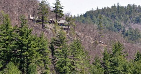 Critics say homes built in the uplands mar the scenery. This house is in Keene Valley.  PHOTO BY GEORGE EARL