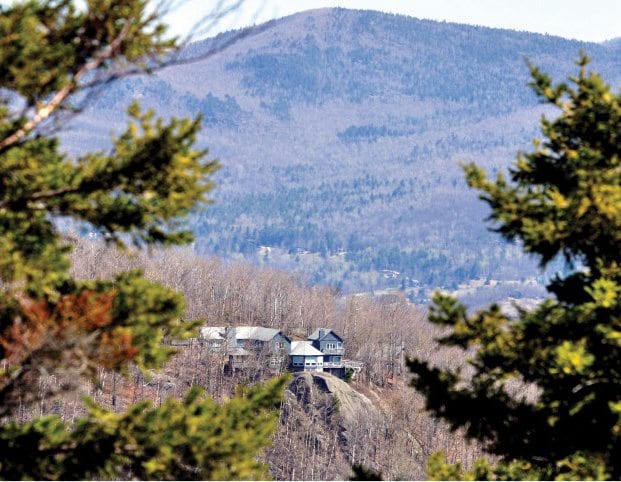 This home in Keene Valley is one of many that have cropped up on Adirondack ridges and hills in recent decades. PHOTO BY NANCIE BATTAGLIA