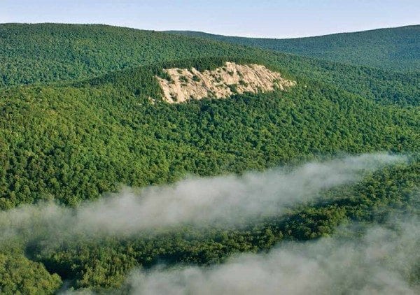 Rock climbers are looking forward to exploring the cliffs of Sugarloaf Mountain near Indian Lake. Photo by Carl Heilman II