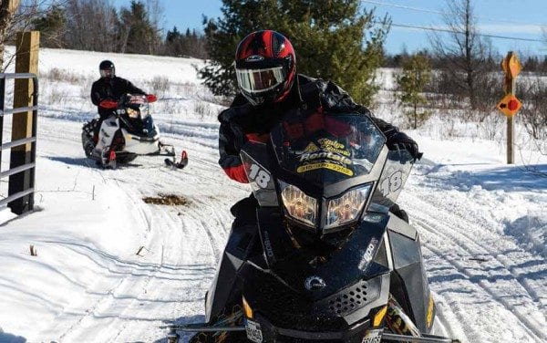 Governor Cuomo rides a snowmobile during the Adirondack Winter Challenge. Courtesy of New York State
