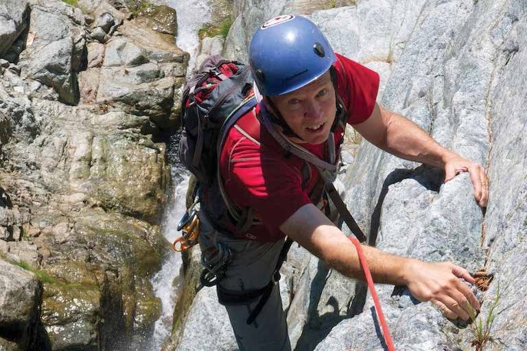 Phil finishes the route near the top of the waterfall. Photo by R.L Stolz