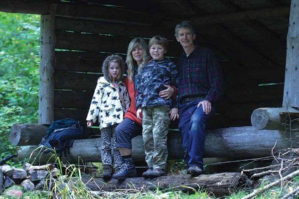 Tassie, Debbie, Ned, and Ed Kanze visit a lean-to near Piseco in 2012. Photo by Ed Kanze