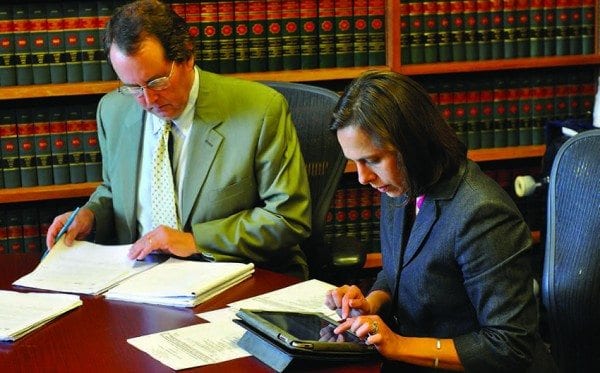 John Caffry and his associate, Claudia Braymer, prepare for oral arguments at the Appellate Division. Photo by Kenneth Aaron.