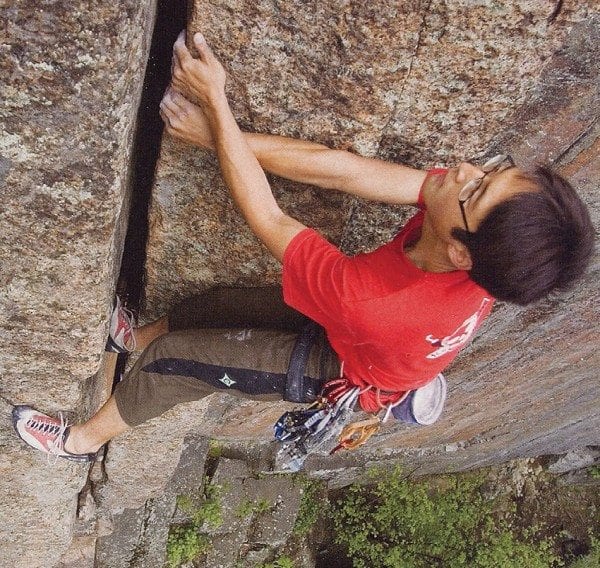 Brian Kim climbs Esthesia on the Spider’s Web in Chapel Pond Pass. Photo by David Le Pagne