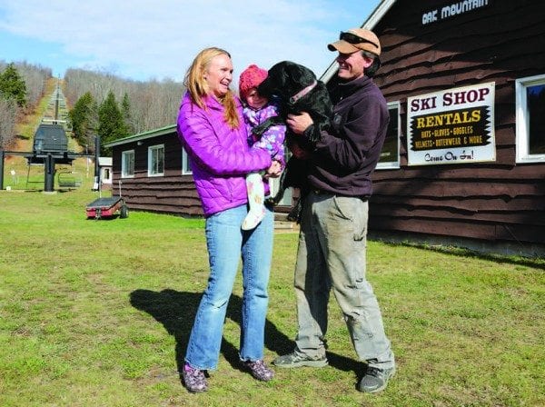 Laura and Matt O’Brien, with the help of daughter Madison and best friend Molly, have taken over Oak Mountain in Speculator. Photo by Mike Lynch