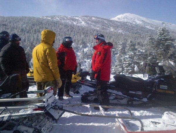 Rescue personnel confer at Marcy Plateau, about a mile below the summit of Mount Marcy. Photo courtesy of DEC