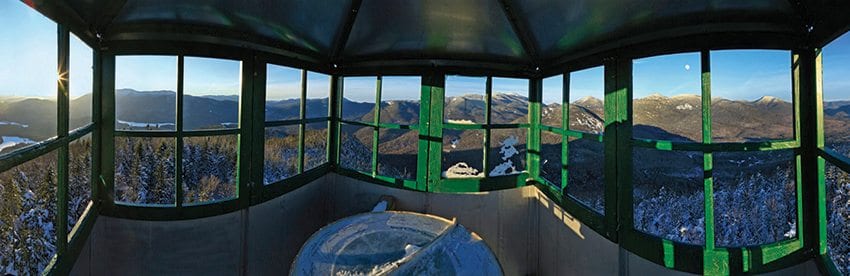 Mount Adams’s fire tower offers a panorama of the High Peaks. Photo by Johnathan Esper