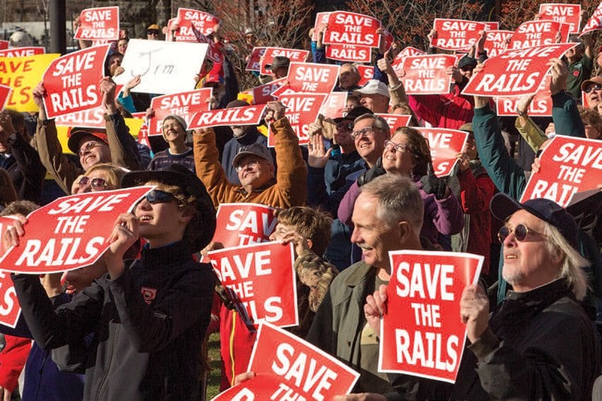 Supporters of the railroad gathered at the Saranac Lake Union Depot in November 2015 for a "Save the Rails" rally. Photo by Mike Lynch