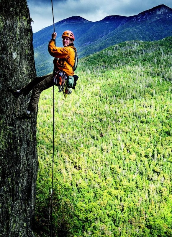 Kevin “MudRat” MacKenzie rappels off Diagonal on Wallface. A climber fell off the route last summer, necessitating a complicated rescue. PHOTO BY KAREN STOLZ / VERTICAL PERSPECTIVES PHOTOGRAPHY