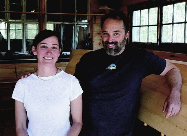 Allison Warner and Rob Davidson at their shop in Lake Clear. PHOTO BY MIKE LYNCH