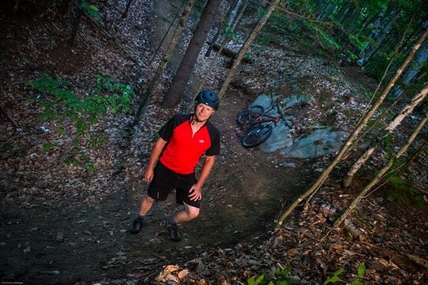 Steve Ovitt designs bike trails that “flow” through the woods. PHOTO BY NANCIE BATTAGLIA