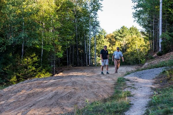 Steve Tomb, left, and Steve Ovitt inspect a trail under construction at the Ski Bowl. Photo by Nancie Battaglia