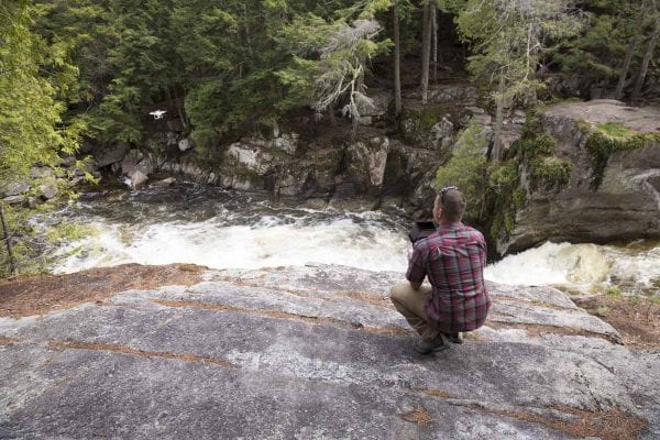 Dave LaMountain operates a drone at the Flume on the West Branch of the Ausable River in Wilmington. The DEC is currently working on new regulations for drones in the Forest Preserve.