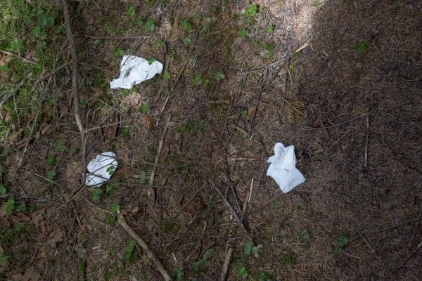 Not everyone uses the pit privy on Cascade Mountain, and toilet paper can be found on spur trails like this one near the summit.