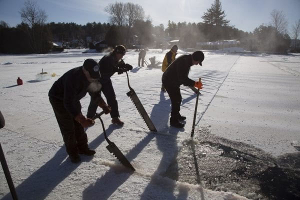 Scenes from Lake Flower on January 26, where volunteer crews were working to build an ice palace for the Saranac Lake Winter Carnival.