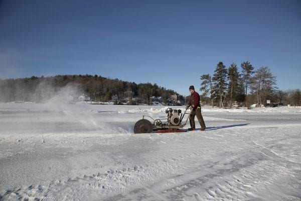 Scenes from Lake Flower on January 26, where volunteer crews were working to build an ice palace for the Saranac Lake Winter Carnival.