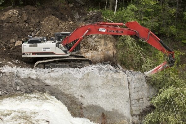 Crews work to remove the Rome Dam on the West Branch of the Ausable River on August 28, 2018. The dam is located upstream of Ausable Forks. Photo by Mike Lynch