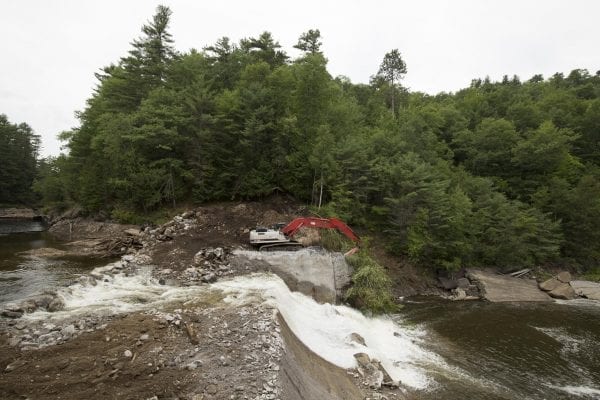 Crews work to remove the Rome Dam on the West Branch of the Ausable River on August 28, 2018. The dam is located upstream of Ausable Forks. Photo by Mike Lynch