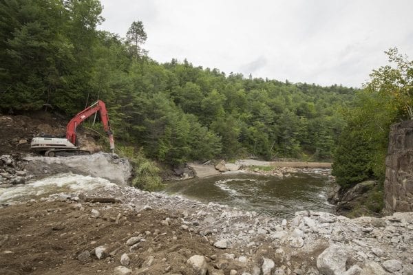 Crews work to remove the Rome Dam on the West Branch of the Ausable River on August 28, 2018. The dam is located upstream of Ausable Forks. Photo by Mike Lynch