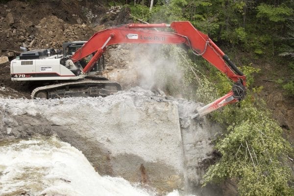 Crews work to remove the Rome Dam on the West Branch of the Ausable River on August 28, 2018. The dam is located upstream of Ausable Forks. Photo by Mike Lynch