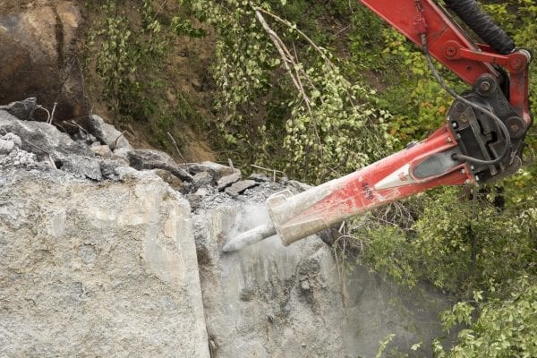 Crews work to remove the Rome Dam on the West Branch of the Ausable River on August 28, 2018. The dam is located upstream of Ausable Forks. Photo by Mike Lynch