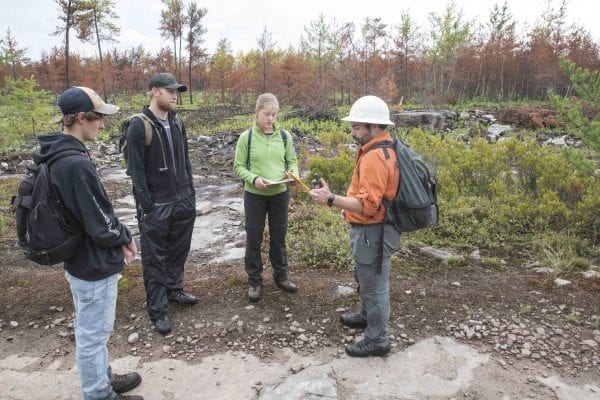 A fire burned more than 500 acres of the Altona Flat Rock forest in July, providing the perfect setting for SUNY Plattsburgh students studying forest ecology. Photo by Mike Lynch