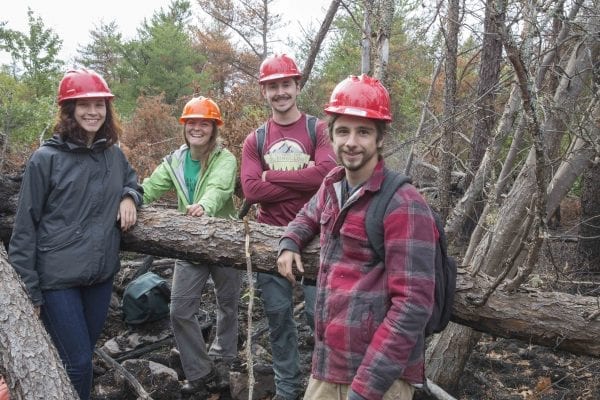 A fire burned more than 500 acres of the Altona Flat Rock forest in July, providing the perfect setting for SUNY Plattsburgh students studying forest ecology. Photo by Mike Lynch